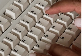 hands typing on keyboard decorative image